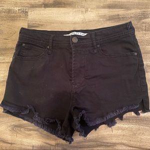 Black distressed jean shorts